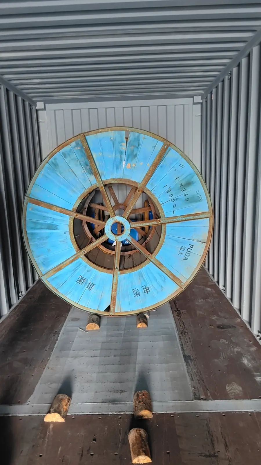 Cable reel secured inside export container